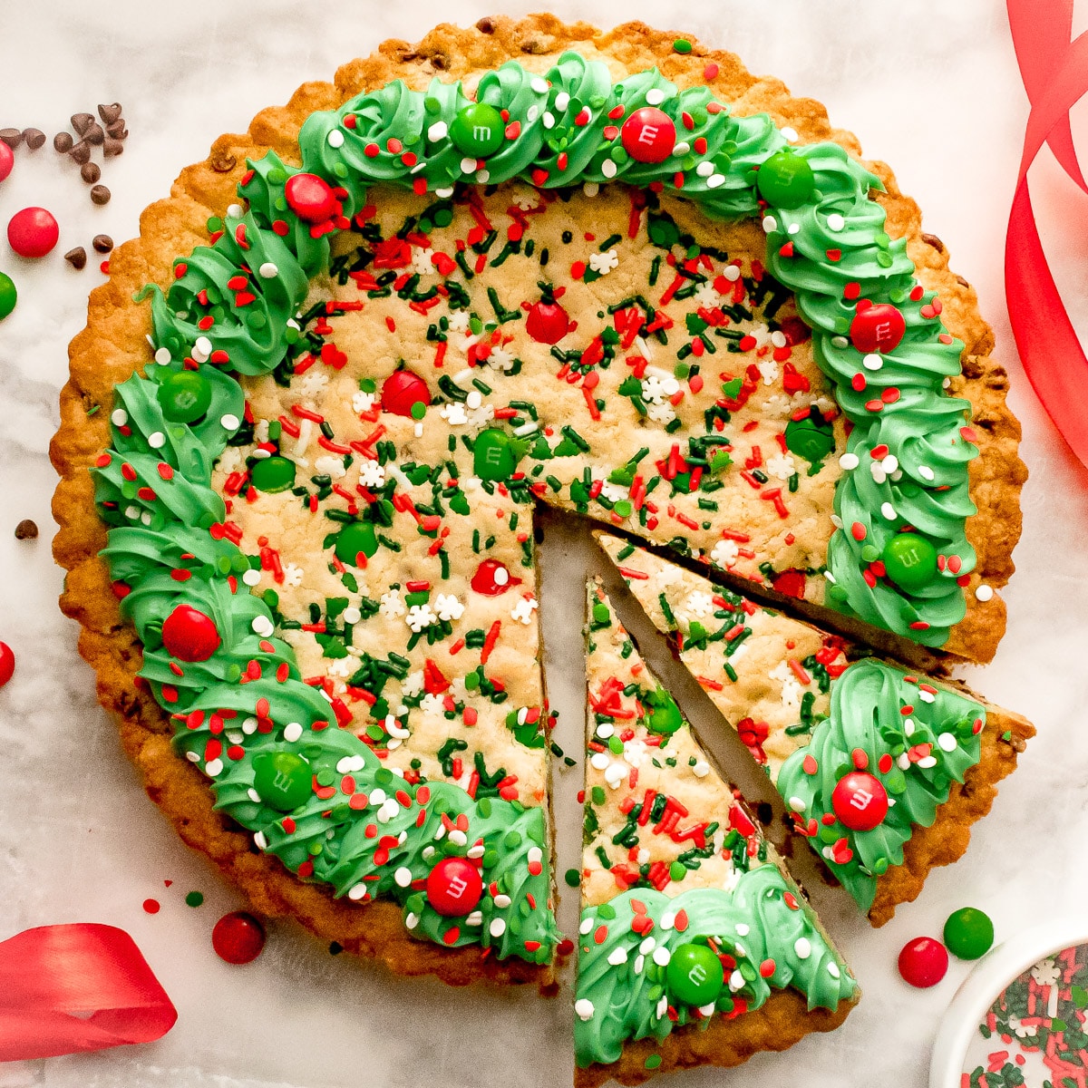 overhead shot of Christmas Cookie cake with two slices cut
