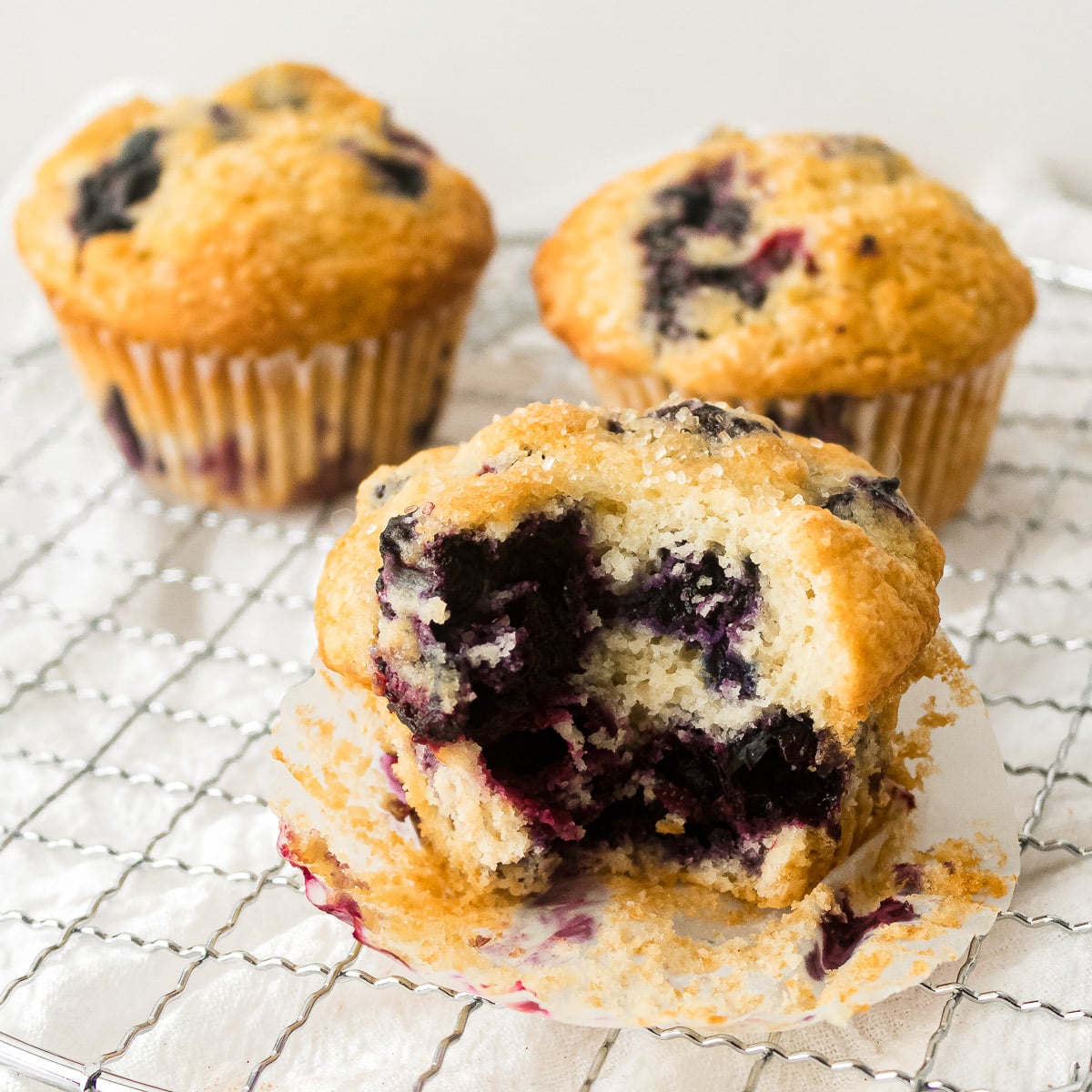 lemon blueberry buttermilk muffins with a bite taken out