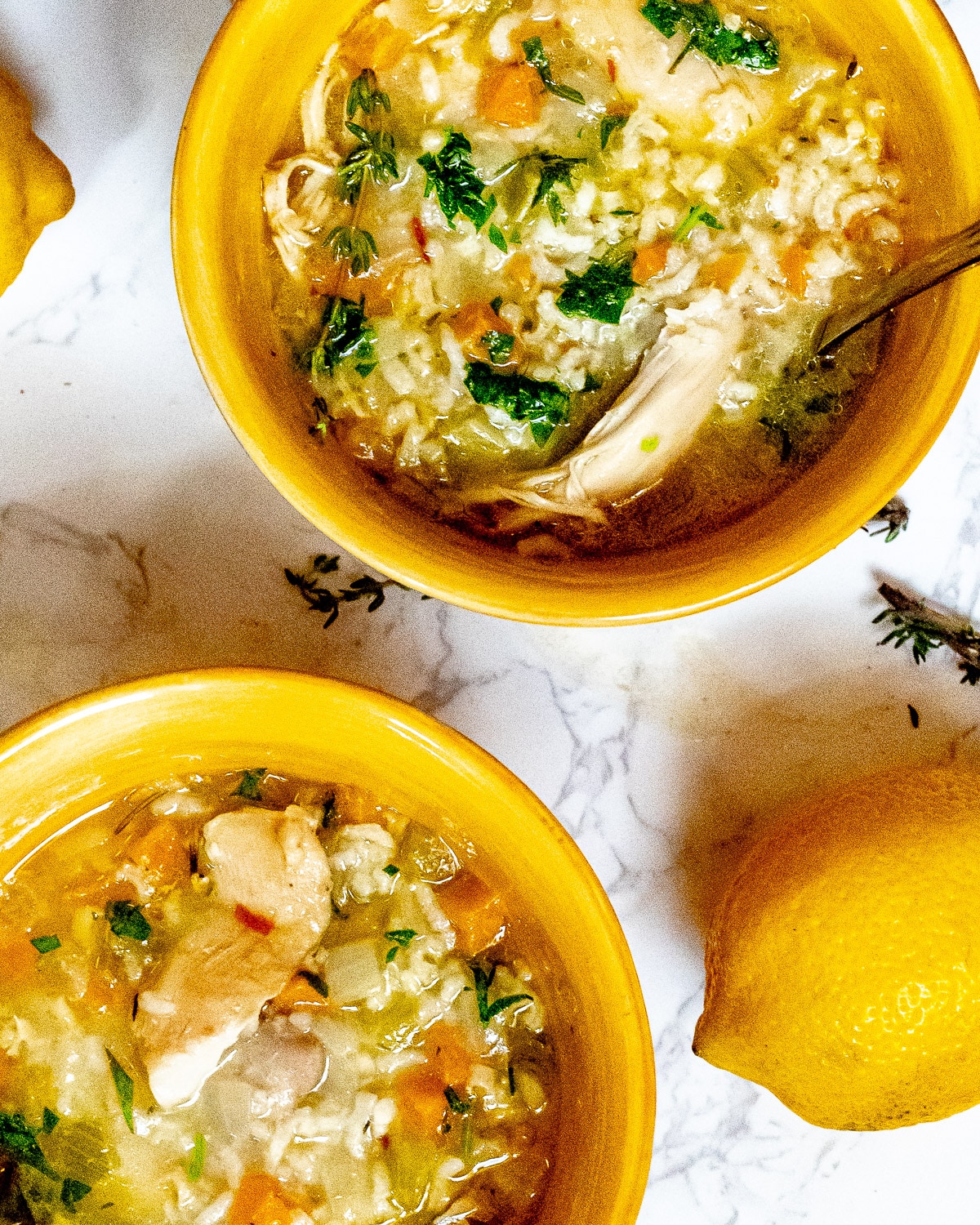 two bowls of instant pot chicken and rice soup