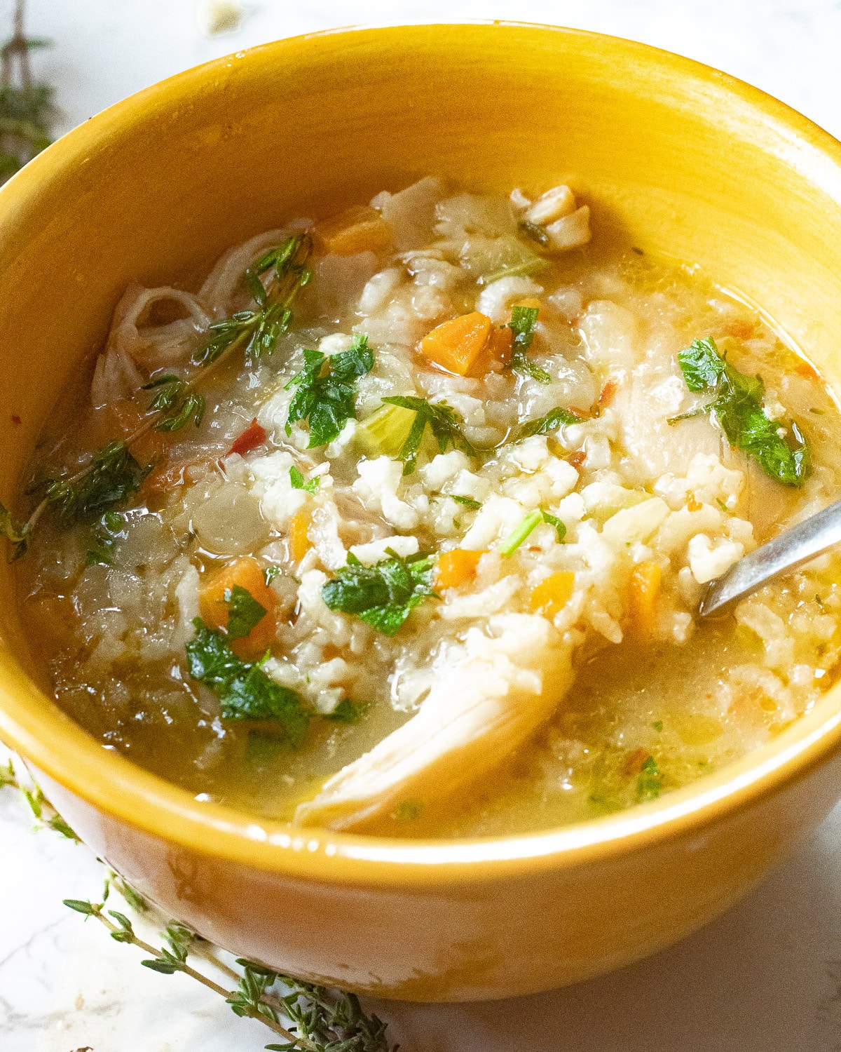 closeup of a bowl of instant pot chicken and rice soup