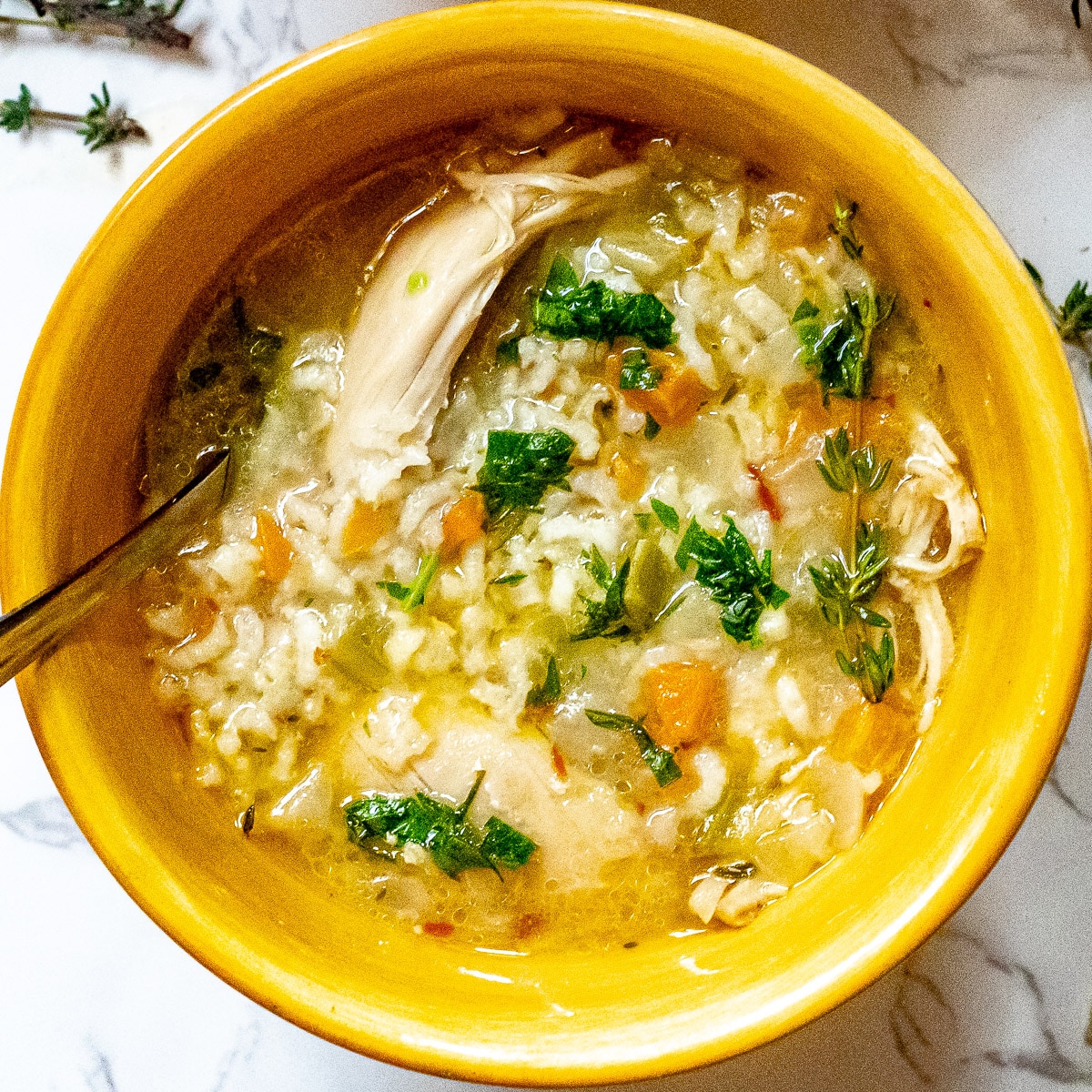 a bowl of instant pot chicken and rice soup