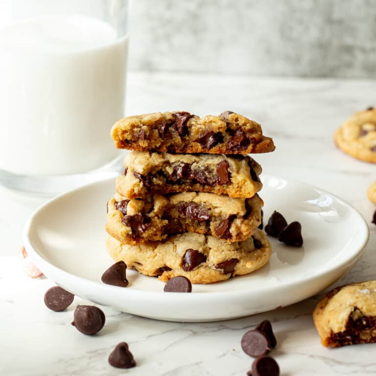 stack of dairy free chocolate cookies with melted chocolate chips