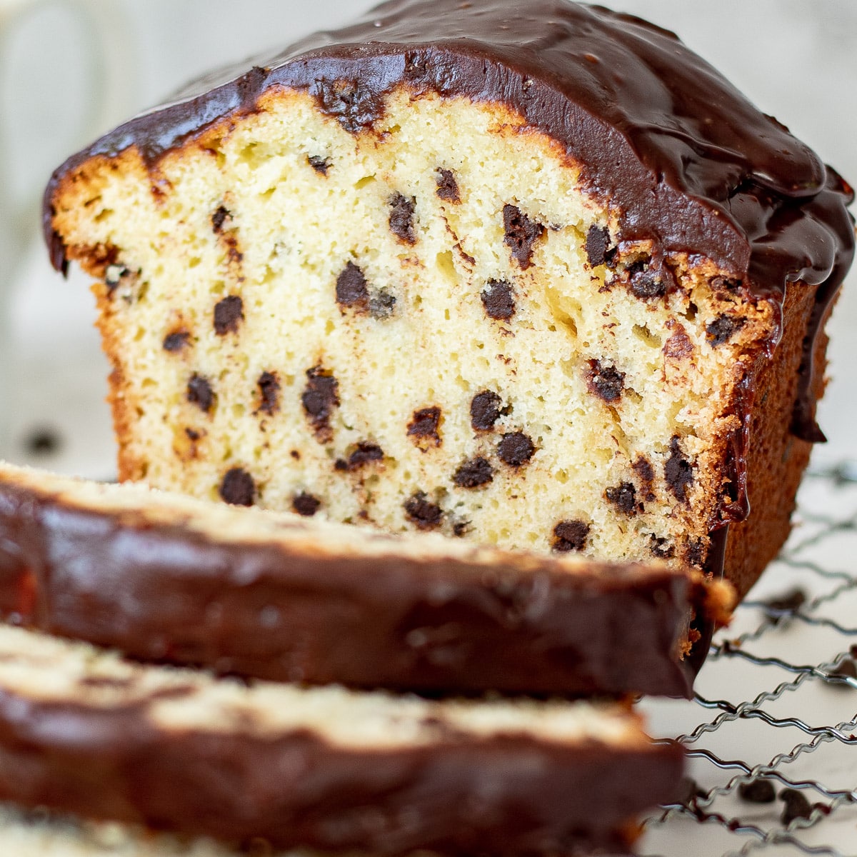 chocolate chip pound cake loaf sliced on a tray