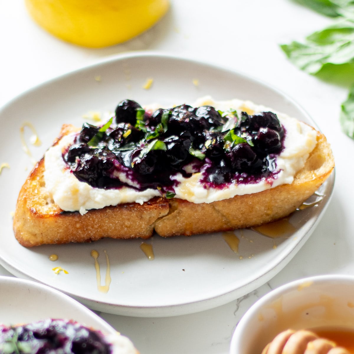 ricotta blueberry toast on a plate