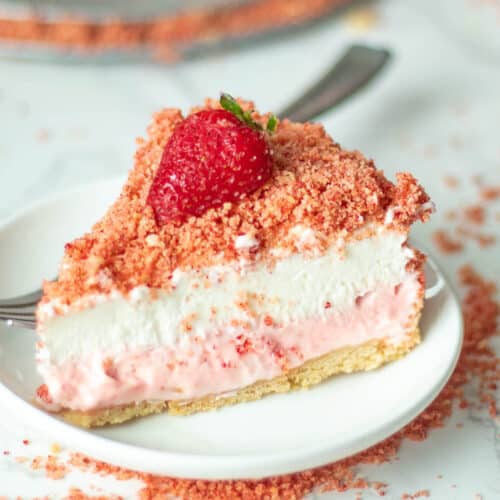 a slice of strawberry crunch cheesecake