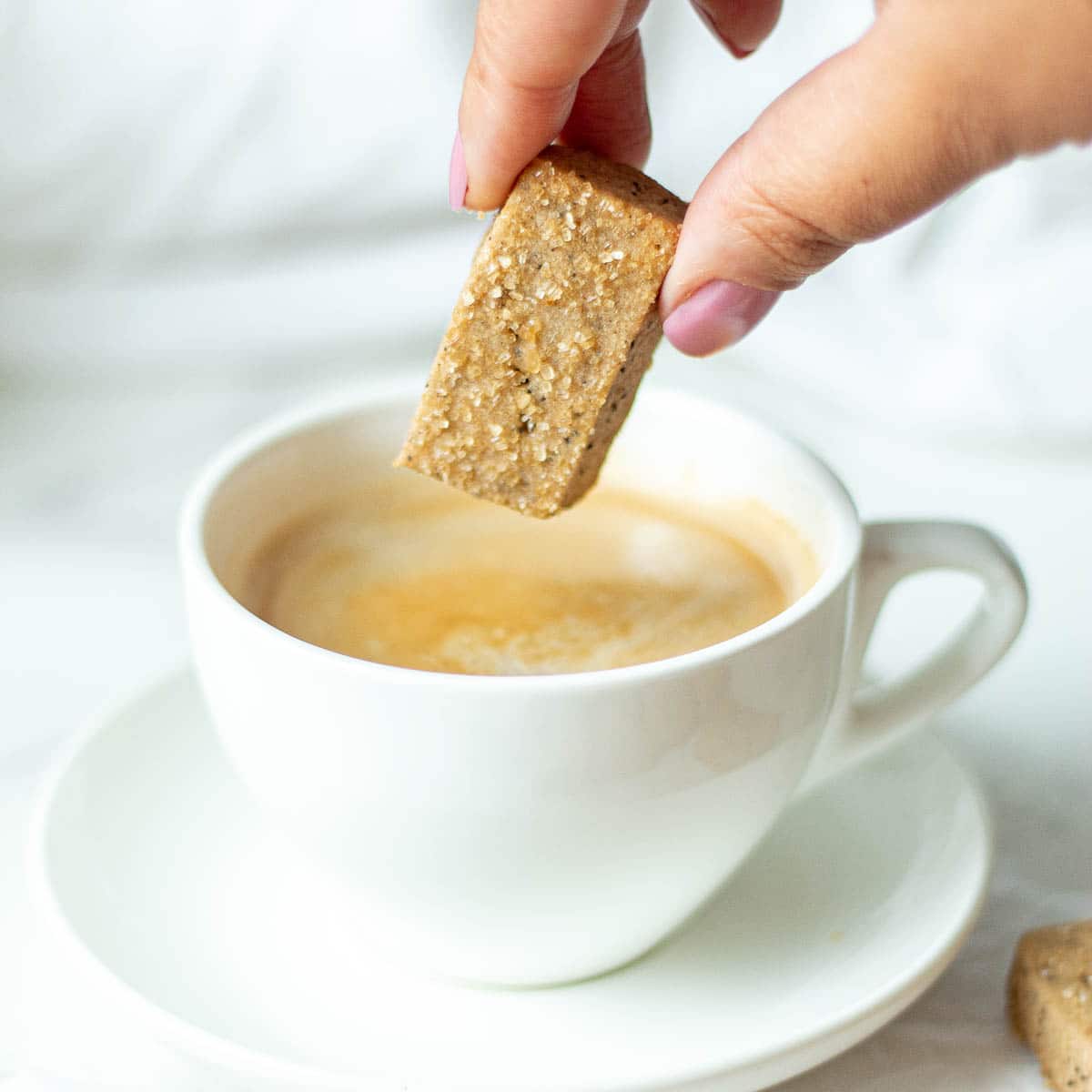 dipping coffee cookies in coffee