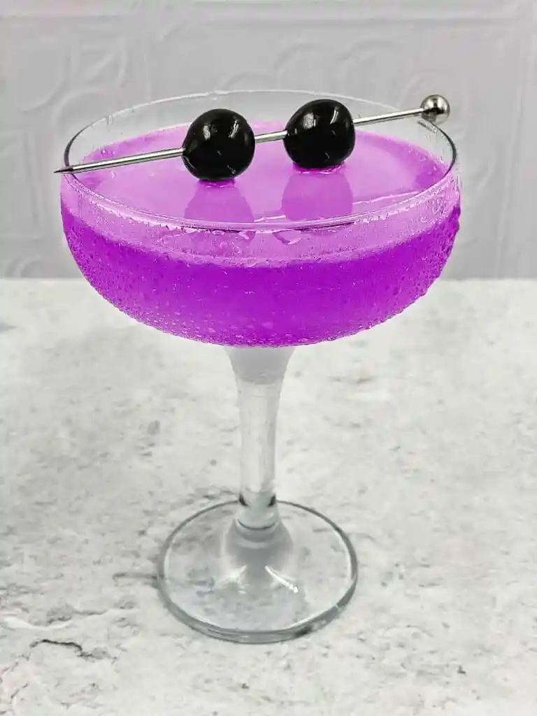 Aviation cocktail with cherries