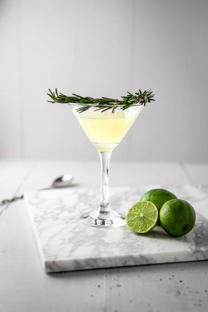 Christmas cocktail with rosemary on top