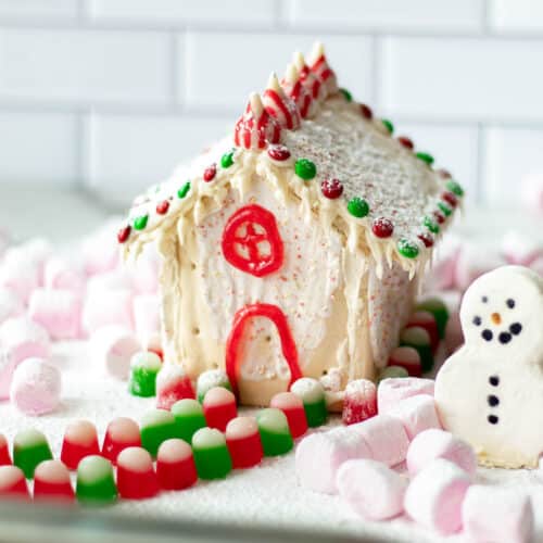 pop tart gingerbread house decorated with candy and marshmallows