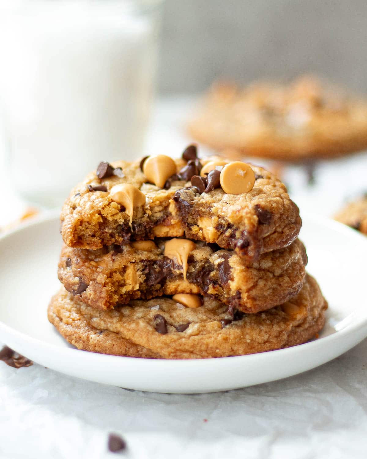 best butterscotch chocolate chip cookies stacked on a plate